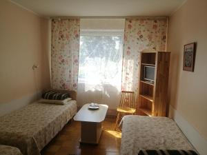 Postel nebo postele na pokoji v ubytování Mahtra Hostel