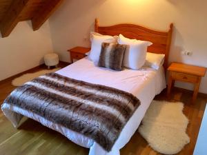 A bed or beds in a room at Vora Riu