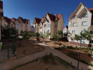 a row of houses in a residential neighbourhood at Bel appartement à Ifrane in Ifrane