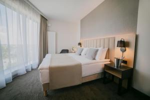 Posteľ alebo postele v izbe v ubytovaní B&B HOTEL Warsaw East