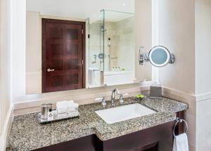 a bathroom with a sink and a mirror at InterContinental Boston, an IHG Hotel in Boston