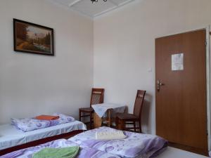 
Ein Bett oder Betten in einem Zimmer der Unterkunft Kraków Hostel
