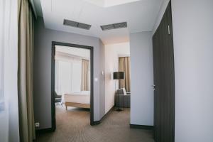 Posteľ alebo postele v izbe v ubytovaní B&B HOTEL Warsaw East