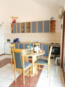 Kuchyň nebo kuchyňský kout v ubytování Apartment Biljana
