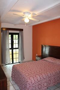 Postel nebo postele na pokoji v ubytování Hotel Boutique Real Tequila