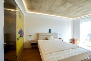 A bed or beds in a room at A9 Luxury Balatonudvari