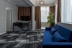 Un televizor și/sau centru de divertisment la Hotel PASO