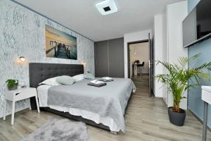 Ένα ή περισσότερα κρεβάτια σε δωμάτιο στο Pop holiday house Zadar +9 φωτογραφίες