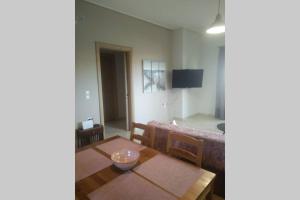 TV a/nebo společenská místnost v ubytování Kalypso relaxing shelter