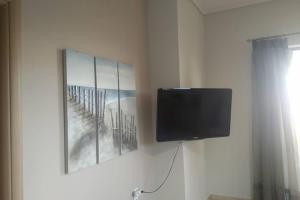 TV a/nebo společenská místnost v ubytování Kalypso relaxing shelter