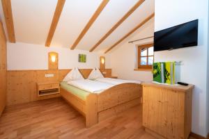 Кровать или кровати в номере Sennerhof