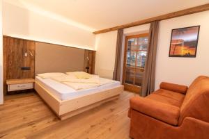 A bed or beds in a room at Sennerhof