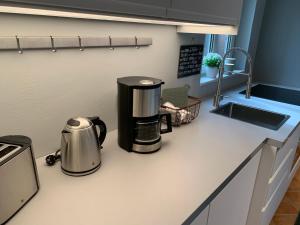 Kuchyň nebo kuchyňský kout v ubytování Traumhafte Ferienwohnung nahe dem Nord-Ostsee-Kanal