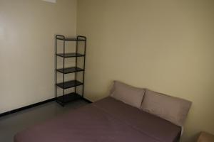 Ένα ή περισσότερα κρεβάτια σε δωμάτιο στο Le Calme a Temara