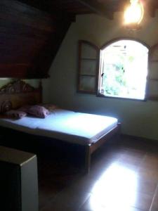 Ένα ή περισσότερα κρεβάτια σε δωμάτιο στο Chalet da vila