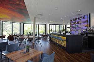 Nápoje v ubytování EINSTEIN Hotel am Römerpark