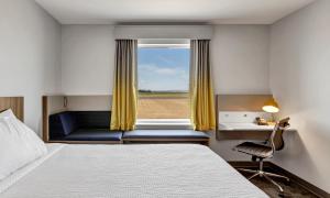 Postel nebo postele na pokoji v ubytování Holiday Inn Express & Suites George - Quincy South by IHG + 37 fotografií
