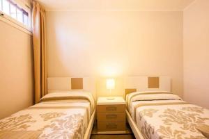 Posteľ alebo postele v izbe v ubytovaní 1 Bedroom Apartment for 4 people in Tenerife