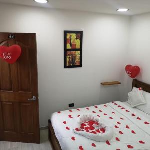 Postel nebo postele na pokoji v ubytování Hotel Palmi