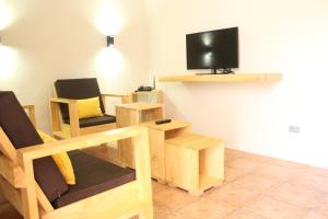 TV a/nebo společenská místnost v ubytování Hotel Bahia del Sol