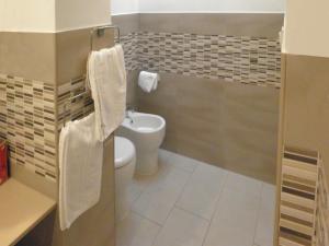 Kylpyhuone majoituspaikassa IL TRULLO Modern Rooms