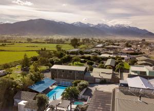 a large building with a lot of trees on top of it at Dusky Lodge in Kaikoura