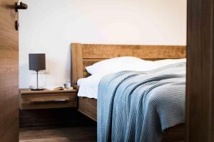 Postel nebo postele na pokoji v ubytování Gästehaus Erika - by myNests