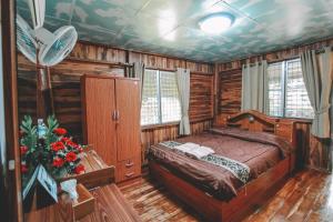 Postel nebo postele na pokoji v ubytování Akchanok Homestay