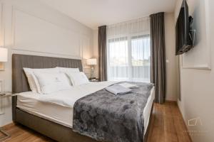 Postel nebo postele na pokoji v ubytování Luxury Villa MetraMaris1