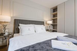 Postel nebo postele na pokoji v ubytování Luxury Villa MetraMaris1