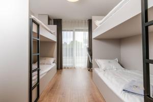 Postel nebo postele na pokoji v ubytování Luxury Villa MetraMaris1