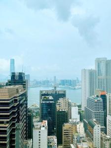 Nespecifikovaný výhled na destinaci Hongkong nebo výhled na město při pohledu z hotelu