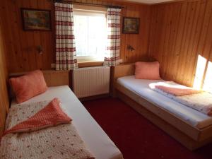 Łóżko lub łóżka w pokoju w obiekcie Ferienhaus Nadine