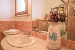 
Een badkamer bij Hotel Aldiola Country Resort
