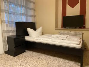 Postel nebo postele na pokoji v ubytování WA121 - Monteurwohnung in Wackersdorf