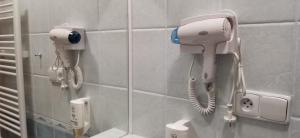 Kúpeľňa v ubytovaní HOTEL SVRATKA