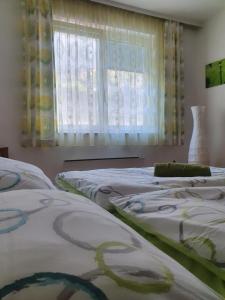 Voodi või voodid majutusasutuse Appartment Weingut Hess toas