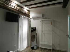 TV a/nebo společenská místnost v ubytování El Patio de San Nicolas