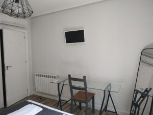 TV a/nebo společenská místnost v ubytování El Patio de San Nicolas