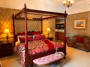 a bed room with a large bed with a canopy at Bli Bli House Riverside Retreat in Twin Waters