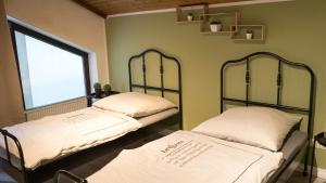 เตียงในห้องที่ Word & stay Vohburg near Ingolstadt