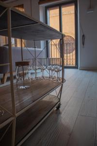 A bed or beds in a room at La Casa Del Miracle