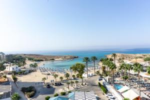 an aerial view of the beach and the ocean at Anonymous Beach Hotel (Adults 16+) in Ayia Napa