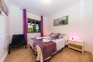 Posteľ alebo postele v izbe v ubytovaní Casa Paqui Alcudia