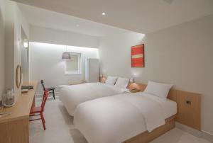 BLO BY BLO HOTEL客房内的一张或多张床位