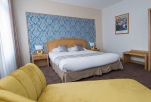 Postel nebo postele na pokoji v ubytování Hotel Eden