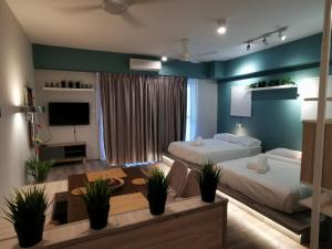 Postel nebo postele na pokoji v ubytování Zen at Midhills Genting