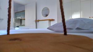Postel nebo postele na pokoji v ubytování LIKNO'S Ios island Resort