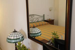 A bed or beds in a room at Hotel I Platani