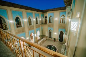 an overhead view of a building with a staircase at Boutique hotel Shakh in Bukhara